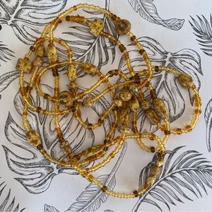 Long speckled beaded earth tone necklace